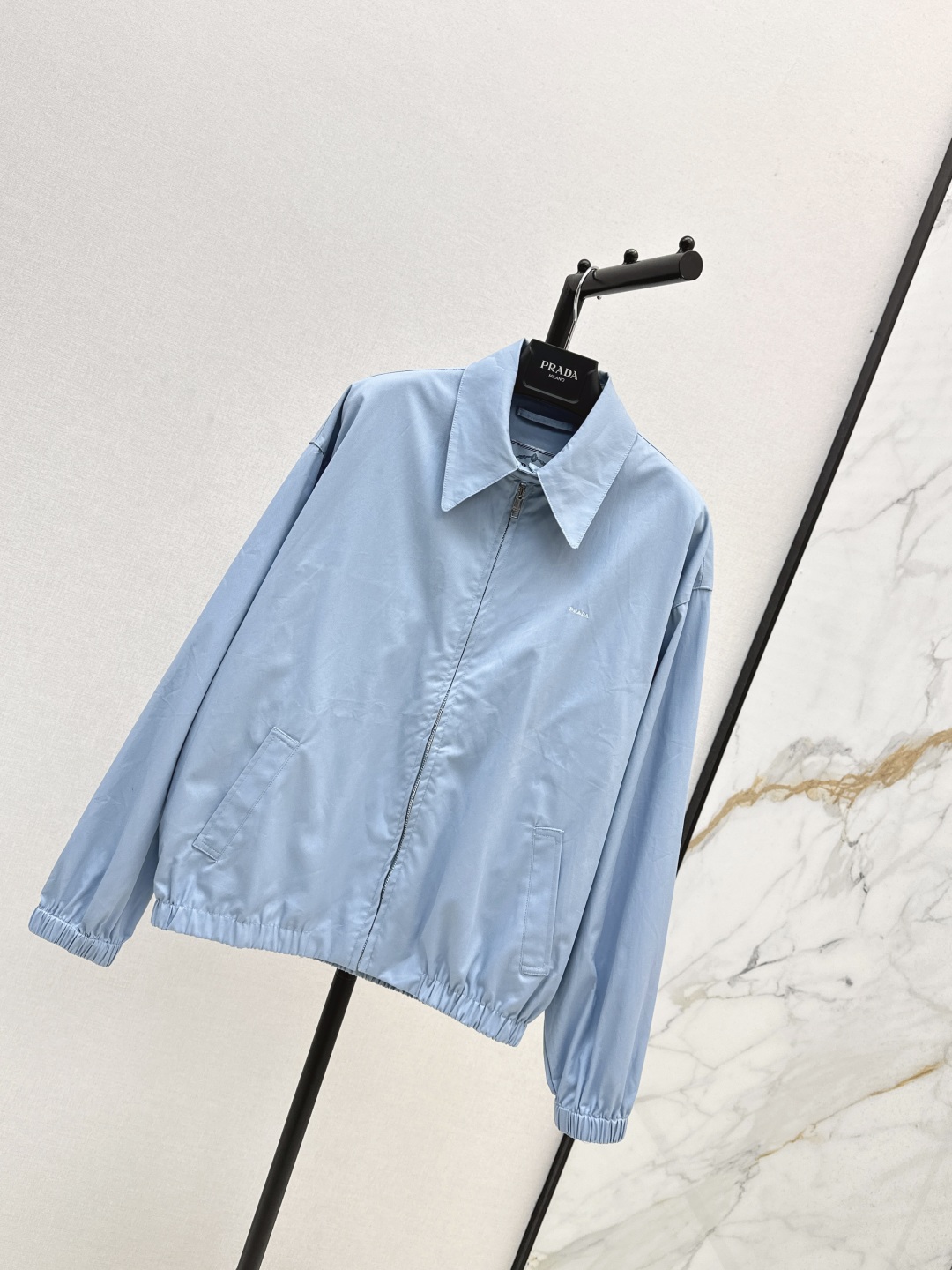 Prada Light Blue Jacket With Back Triangle Logo, Perfect for Fall 3 cmp i1756613144709 1180 0 1