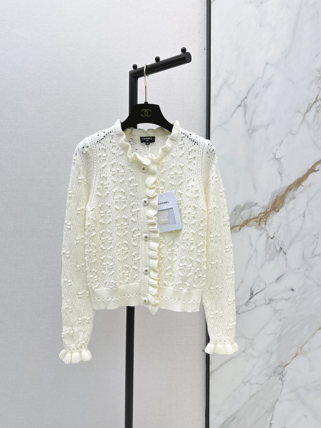 NO:801485,C Family 26Ss————The latest ladylike style for spring and summer, the cardigan with ear-cut hollow crochet is gentle and a little delicate and noble, like wearing the spring moonlight on the body~ The upper body is like a gentle lady. One color ready for sale sml,,chanel,19860909C家 26Ss————春夏最新款名媛气质木耳边开衫镂空钩花 温柔又带点精致贵气 像把春日月光穿在身上～ 上身就是温柔小姐姐 一色现货发售sml,,chanel,,Women's clothing