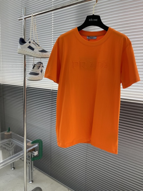 Prada Men's Orange Embossed Logo Crewneck T-Shirt - SS24 Collection 1 Prada Men's Orange Embossed Logo Crewneck T-Shirt - SS24 Collection
