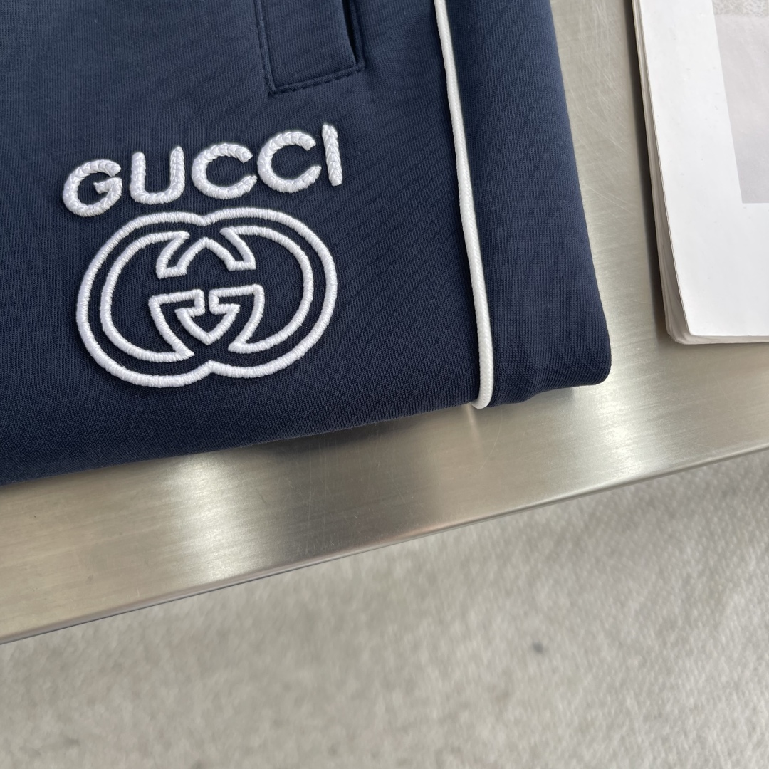Gucci Men's Navy Blue Jogger Pants with White Logo and Side Stripes 5 cmp i1743495799767 4117 0 4
