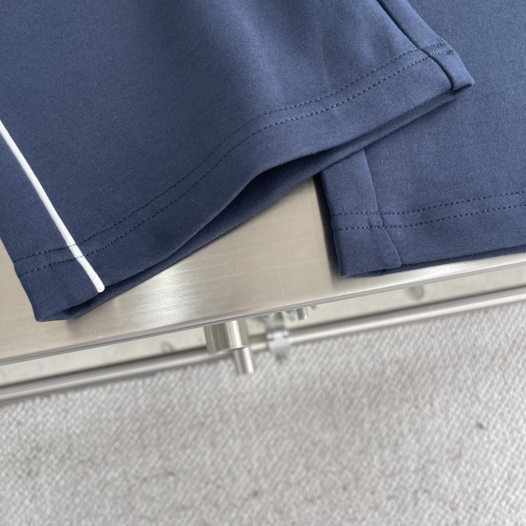 Gucci Men's Navy Blue Jogger Pants with White Logo and Side Stripes 7 cmp i1743495799776 3463 0 5
