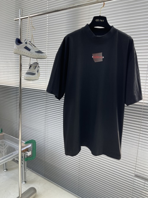 Balenciaga Black Cotton T-Shirt with Orange Tape Embroidery - Unisex 1 Balenciaga Black Cotton T-Shirt with Orange Tape Embroidery - Unisex