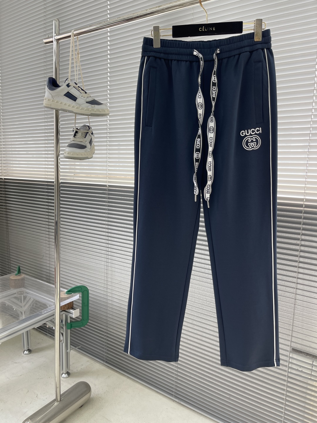 Gucci Men's Navy Blue Jogger Pants with White Logo and Side Stripes 1 cmp i1743679365696 9105 0 7