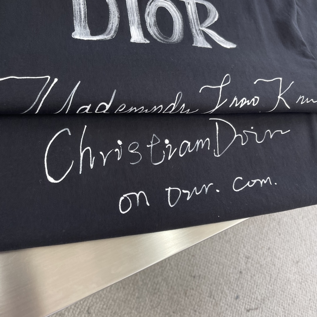 Dior Men's Black Cotton Jersey T-Shirt With Hand-Painted Logo 7 cmp i1744720341989 5187 0 4