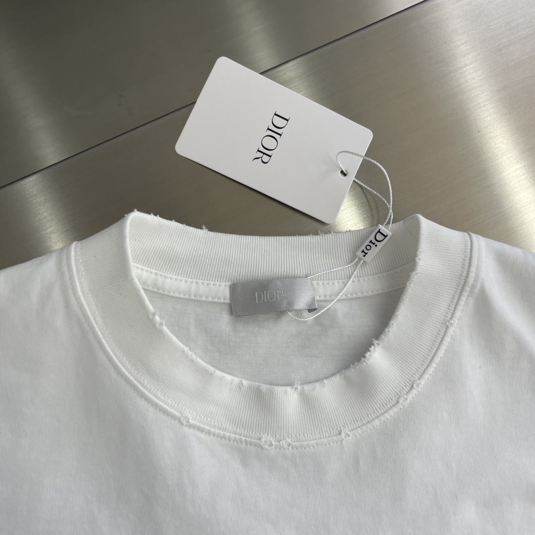 Dior White Cotton Jersey T-Shirt with Hand-Painted Signature Logo 3 cmp i1744720373873 7517 0 0