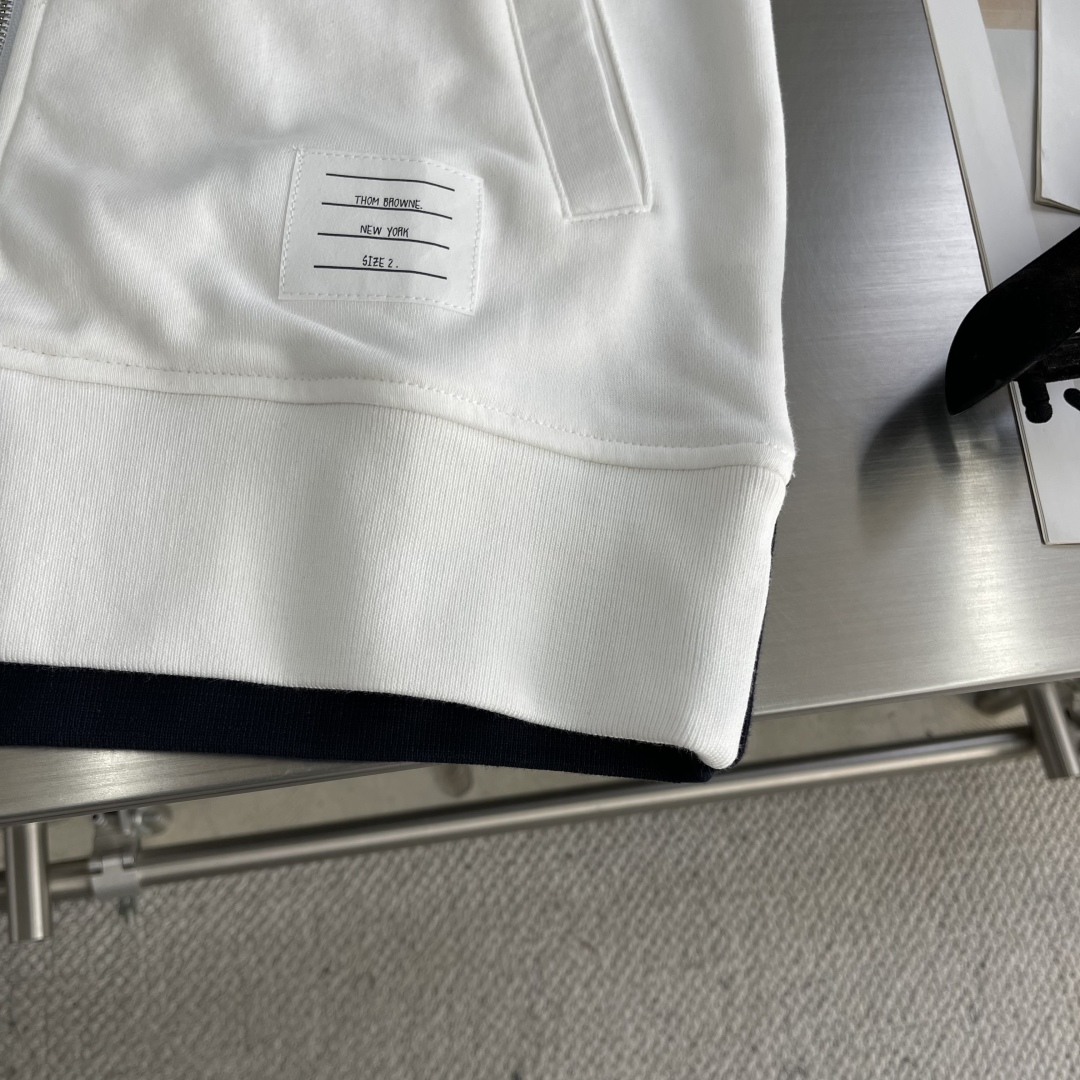 Thom Browne Four-Bar Stripe Zip-Up Jacket: A Modern, Creative Design 6 cmp i1744885549837 1177 0 2
