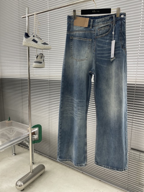 MM6 Maison Margiela Patched Distressed Wide-Leg Jeans in Light Blue 1 MM6 Maison Margiela Patched Distressed Wide-Leg Jeans in Light Blue