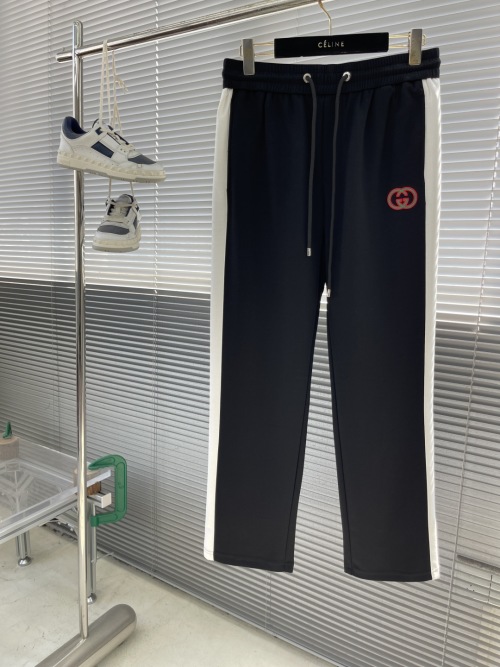 Gucci Men's Black Lounge Pants with White Side Stripe and Logo Detail 1 Gucci Men's Black Lounge Pants with White Side Stripe and Logo Detail