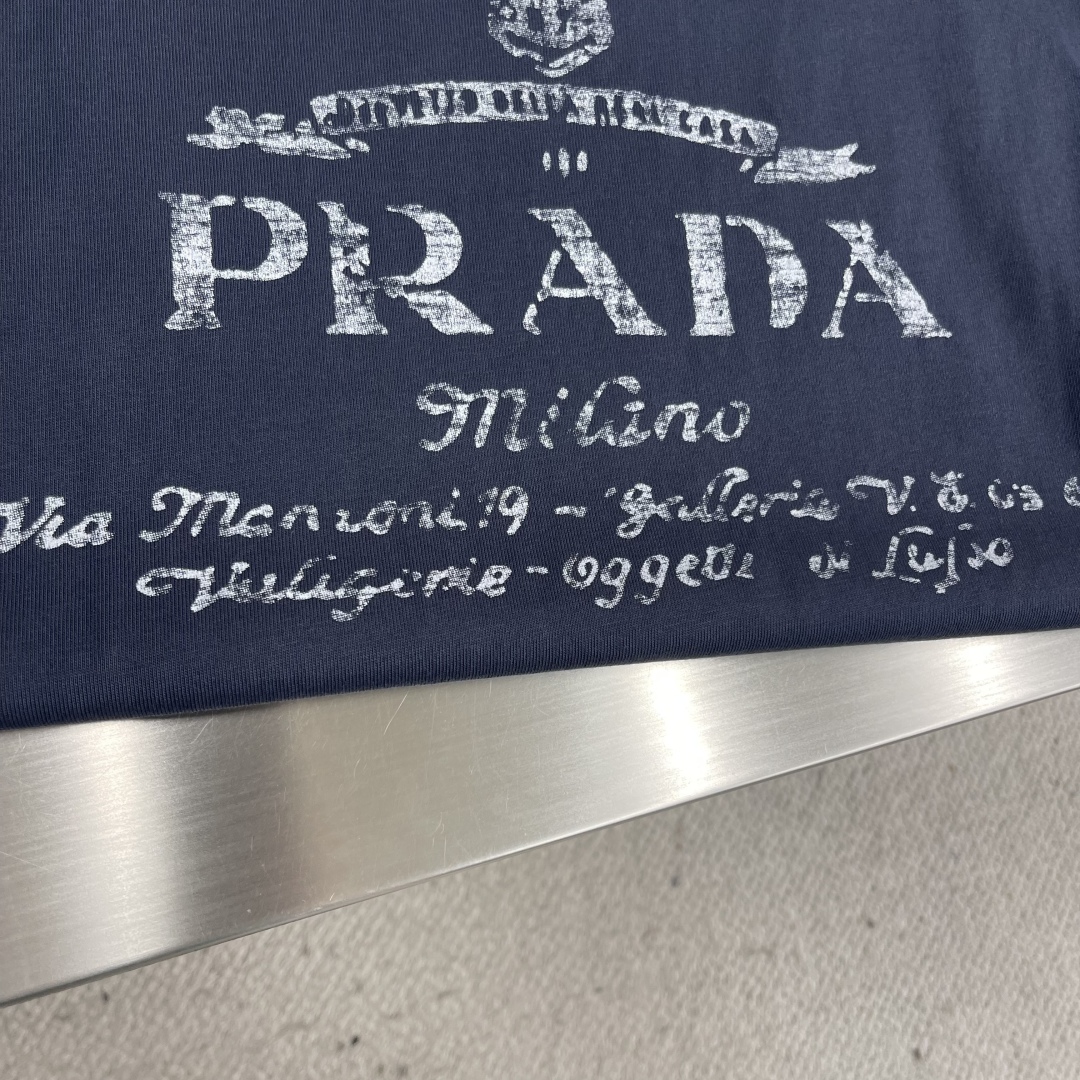 Prada Early Spring 2025 Vintage Hand-Painted Cotton Tee with Distressed Edges 8 cmp i1745410522319 556 0 4