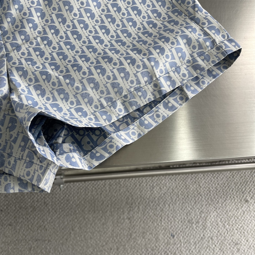 -Dio 26ss新款oblique提花面料搭片设计裤裙采用蓝色科技塔夫绸提花面料精心制作腰间搭扣装饰，