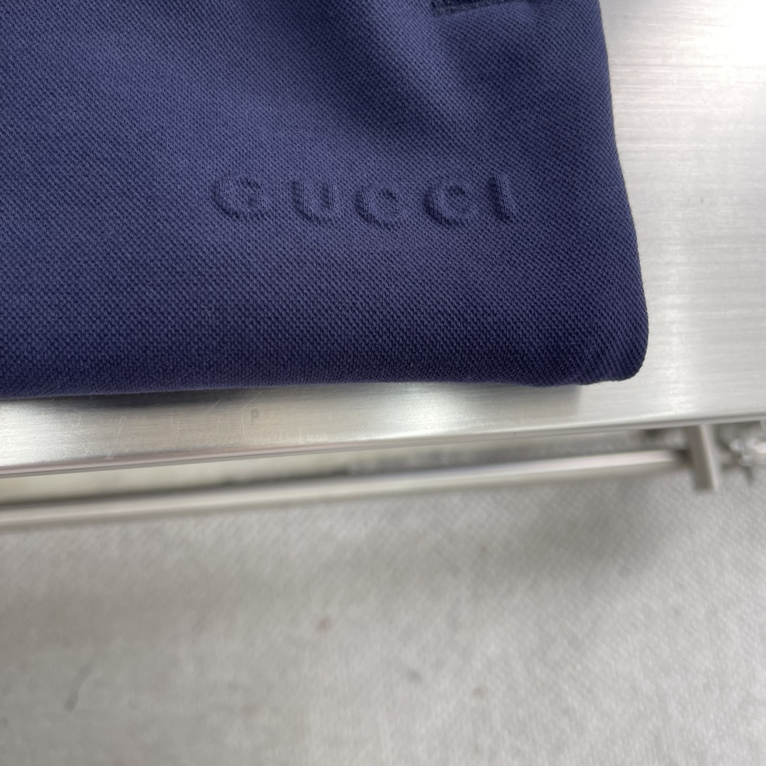 Gucc Transcript Pants: Luxurious Navy Blue Design with Custom Steel Stamp Detail - 图片 6