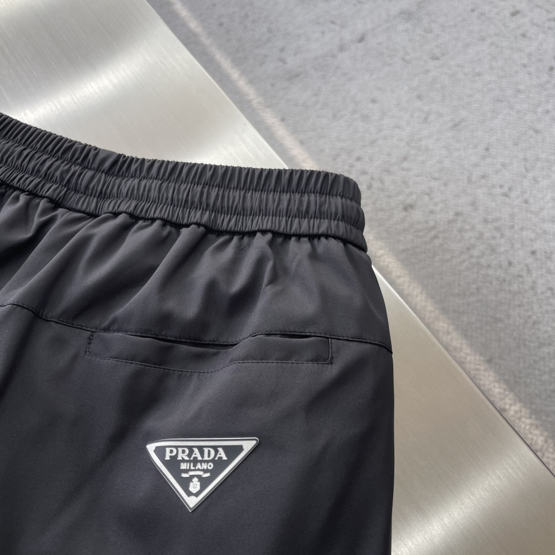 -PRAD 2025秋冬保暖羽绒裤 加厚御寒 贵族血统！设计让人心旷神怡 匠心打造，面料选用爽滑聚酯纤维