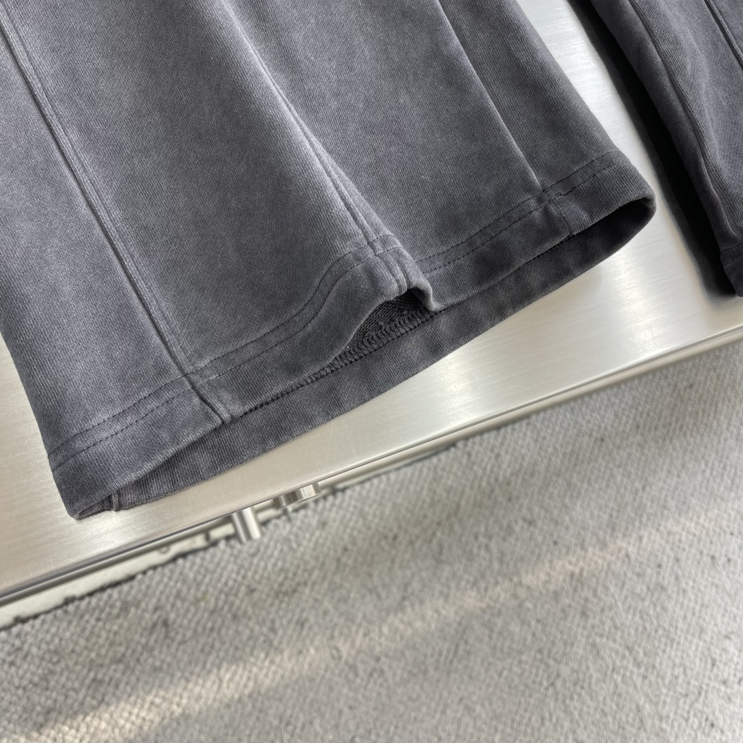 Acne Studios 做旧徽标长裤 7