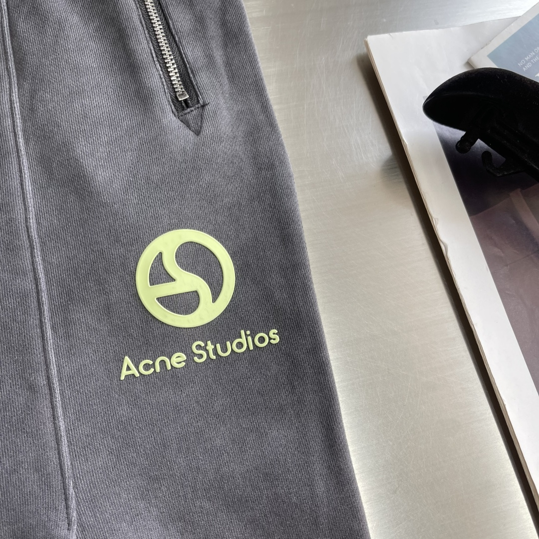 Acne Studios 做旧徽标长裤 6