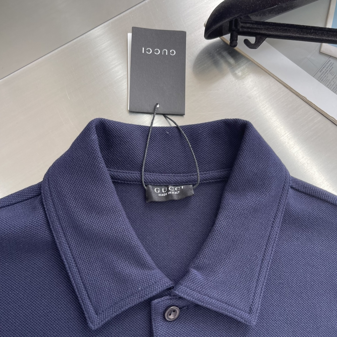 -GUCC 饰刺绣珠地棉翻领T恤。这款单品灵感源自La Famiglia的