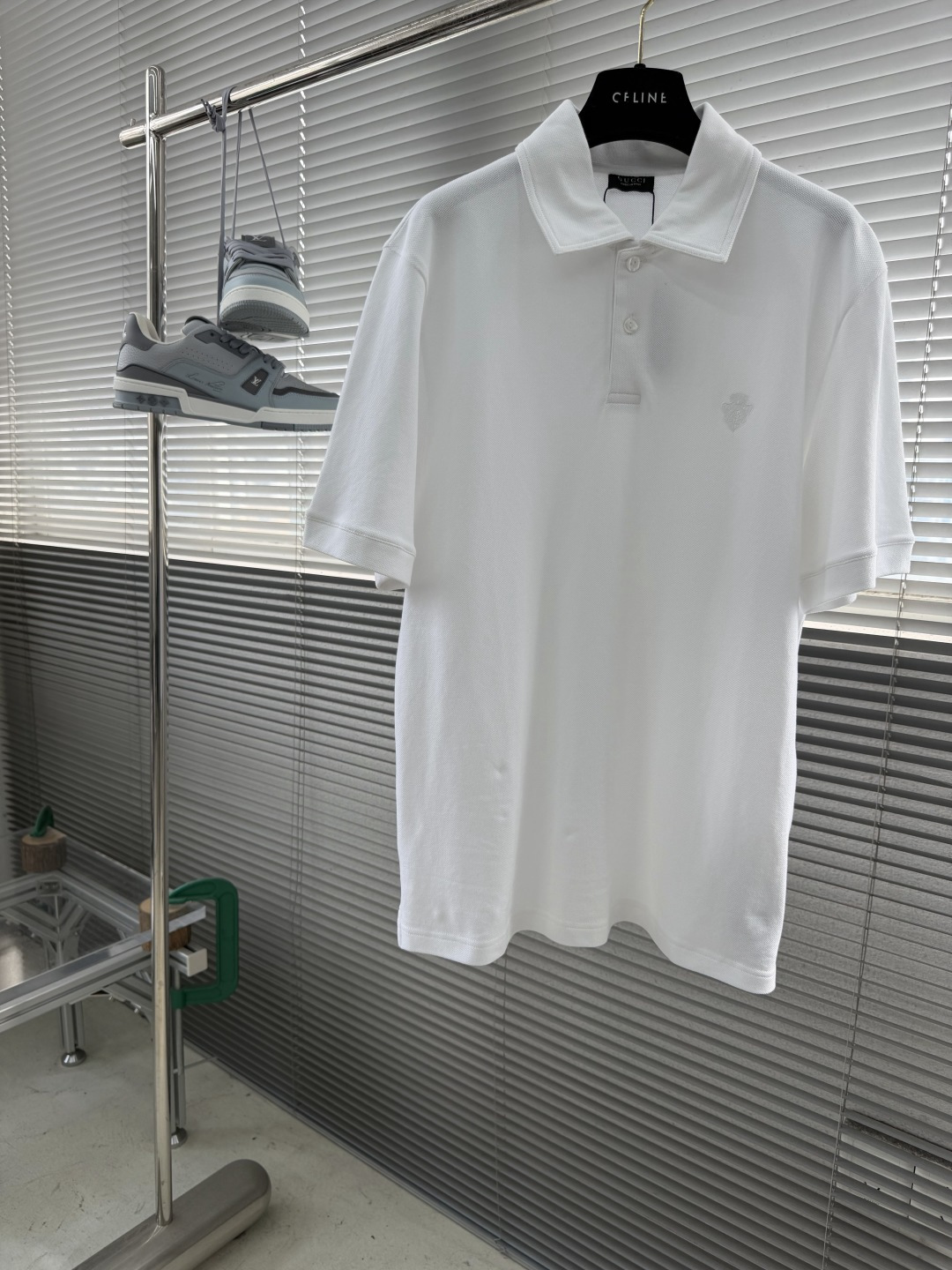 -GUCC 饰刺绣珠地棉翻领T恤。这款单品灵感源自La Famiglia的