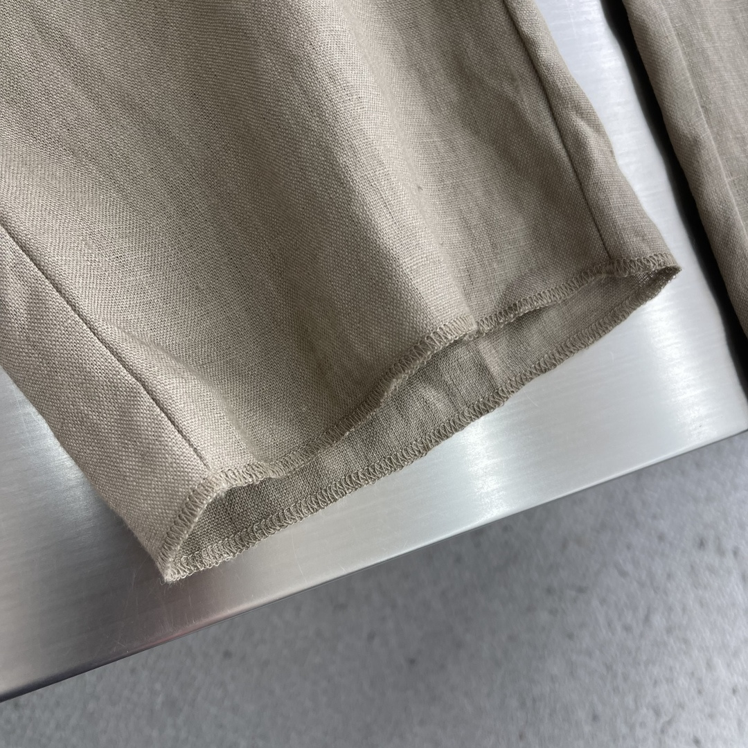 -Loro Piana    100%亚麻皮质扣抽绳休闲长裤一、核心材质与工艺  1. 面料：100%进