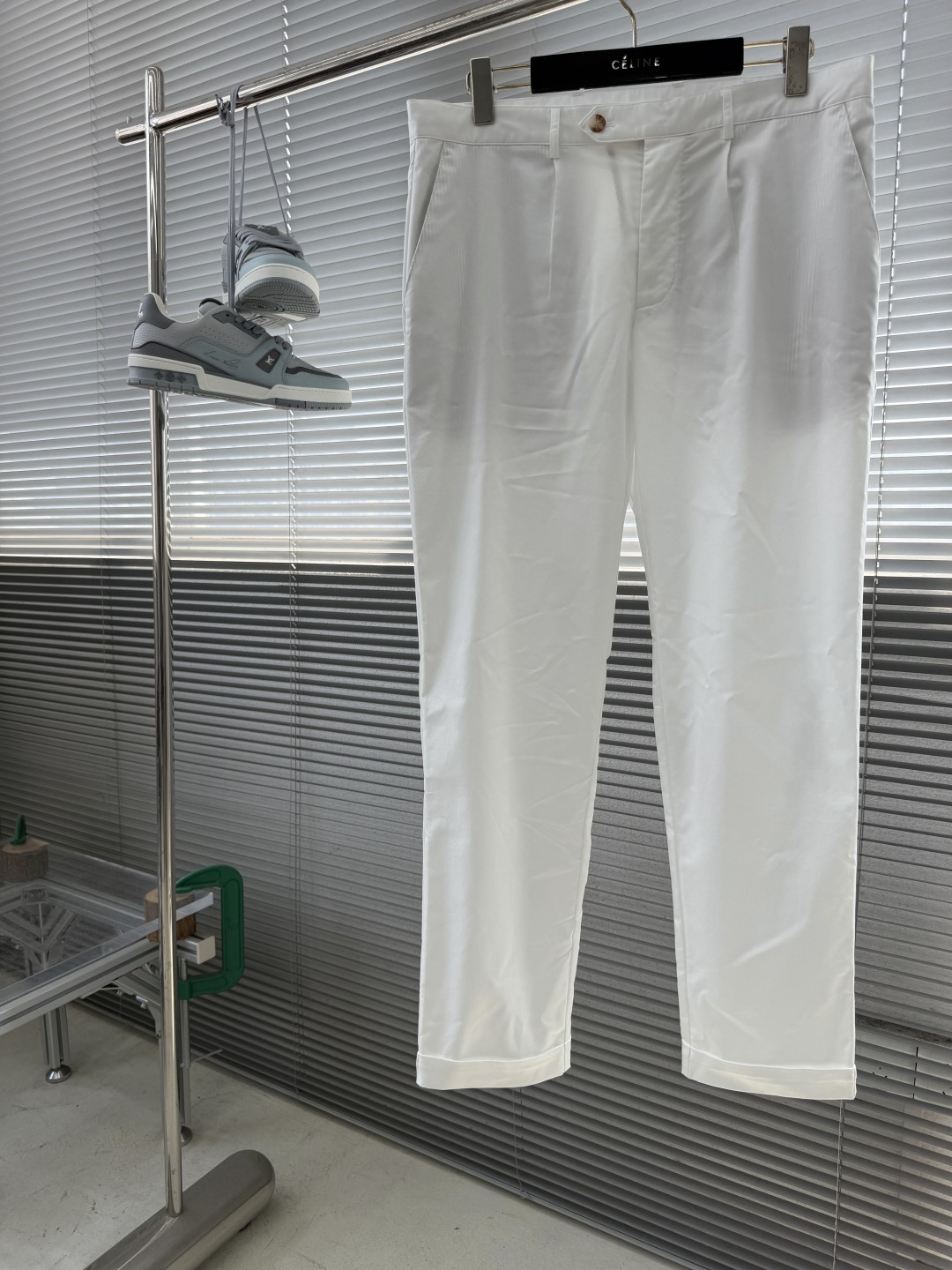 NO:872688,-The classic and iconic BC business casual trousers 'striped lining is the sense of ritual hidden in the details.' When the off-white/pure white/classic black trousers meet the retro brown and white striped lining, there is an unexpected layering hidden in every step.  The imitation tortoiseshell buttons on the front and the contrasting striped webbing on the sides sew low-key sophistication into daily life. Whether it is a lazy weekend with canvas shoes, or a light business occasion with shirts and leather shoes, the striped design of the lining is inadvertently revealed - it turns out that casual pants can also be worn to create a 'both inside and outside' taste. [Wash Recommendations] 1.  It is recommended that the water temperature should be machine washed or hand washed in cold water below 30℃ to avoid high temperature damage to the lyocell fiber and prevent the fabric from shrinking or the striped lining from fading. 2. Use a neutral laundry detergent (such as a wool/silk special detergent), and prohibit bleach and cleaning products containing fluorescent agents to protect the vividness of the lining stripes. 3. Turn the pants inside out before washing, zippers closed, and buttons fastened to reduce pilling or button scratches caused by fabric friction.  4. Dry flat or hang in a ventilated place to dry in the shade, avoid direct sunlight (especially white models are prone to yellowing), and do not tumble dry. 5. Ironing techniques If you need to iron, choose a low temperature setting (below 110°C). The striped side can be ironed with a thin cloth to prevent high temperature from damaging the texture. 6. Storage: Pay attention to washing and drying before hanging and storing to avoid stubborn wrinkles caused by folding for a long time. Store the striped lining separately from dark clothes to prevent staining.  Small reminder: It is recommended to wash the fabric separately before wearing it for the first time to remove the floating color of the fabric and keep it fresh and crisp every time you wear it. Size 42/44/46/48/50/52/54/56 (30-3837), shirts,19860909-BC 商务休闲西裤经典标志性的「条纹内衬,是藏在细节里的仪式感」 当米白/纯净白/经典黑的裤身遇见复古棕白条纹内衬,每一次迈步都藏着不期而遇的层次感. 前襟仿玳瑁纽扣与侧边撞色条纹织带,把低调的精致缝进日常.无论是搭配帆布鞋的慵懒周末,还是衬衫皮鞋的轻商务场合,内衬的条纹心机都在不经意间流露——原来休闲裤,也能穿出「内外兼修」的品味.【洗涤建议事项】  1. 水温控制建议30℃以下冷水轻柔机洗或手洗,避免高温损伤莱赛尔纤维,防止面料缩水或条纹内衬褪色.  2. 洗涤剂选择使用中性洗衣液（如羊毛/丝绸专用洗涤剂）,禁用漂白剂及含荧光剂的清洁产品,保护内衬条纹色彩鲜艳度.  3. 翻面洗涤洗涤前将裤子内侧翻出,拉链拉合、纽扣扣紧,减少面料摩擦导致的起球或纽扣刮伤.  4. 晾晒方式平铺晾干或悬挂于通风处阴干,避免阳光直射（尤其白色款易泛黄）,不可烘干.  5. 熨烫技巧若需熨烫,选择低温档（110℃以下）,内衬条纹面可垫薄布熨烫,防止高温烫坏织纹.  6. 收纳注意洗净晾干后悬挂收纳,避免折叠久放产生顽固褶皱,条纹内衬与深色衣物分开存放,防止染色. 小提醒首次穿着前建议单独洗涤,去除面料浮色,让每一次穿着都保持最初的清爽与挺括. 码数42/44/46/48/50/52/54/56（30-3837）,,shirts,,Men's clothing