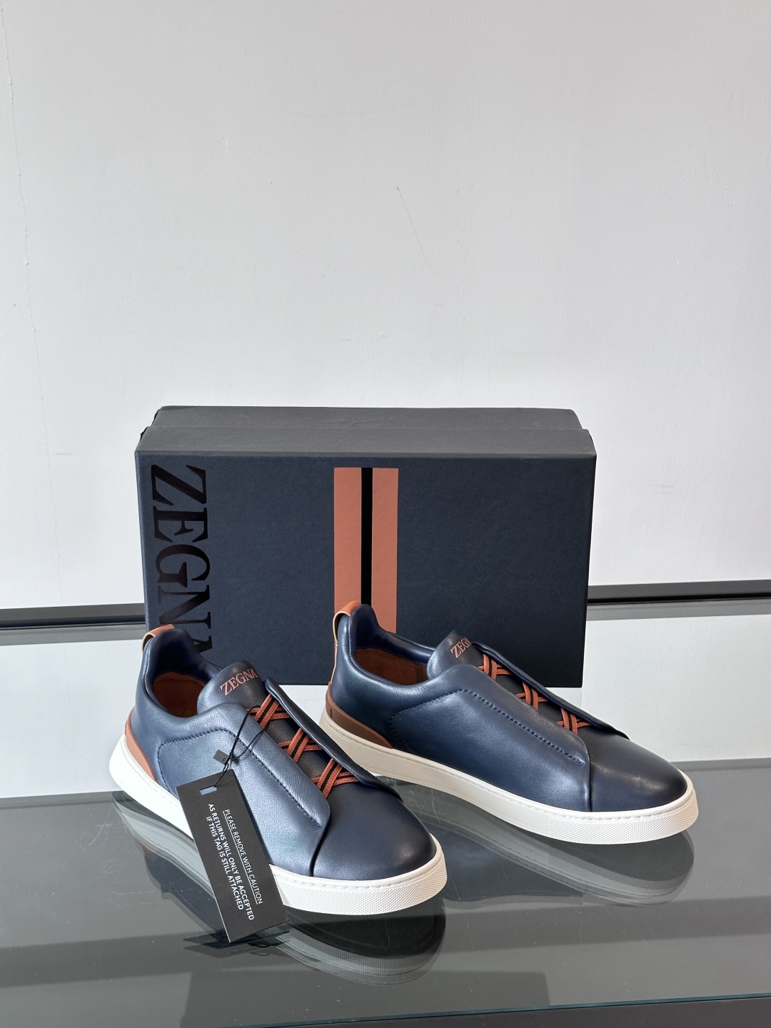 ZEGNA/杰尼亚 新款男士低帮皮革运动鞋，选用进口牛皮打造，丰富的工艺细节，鞋底骆马皮革嵌饰和品牌压纹