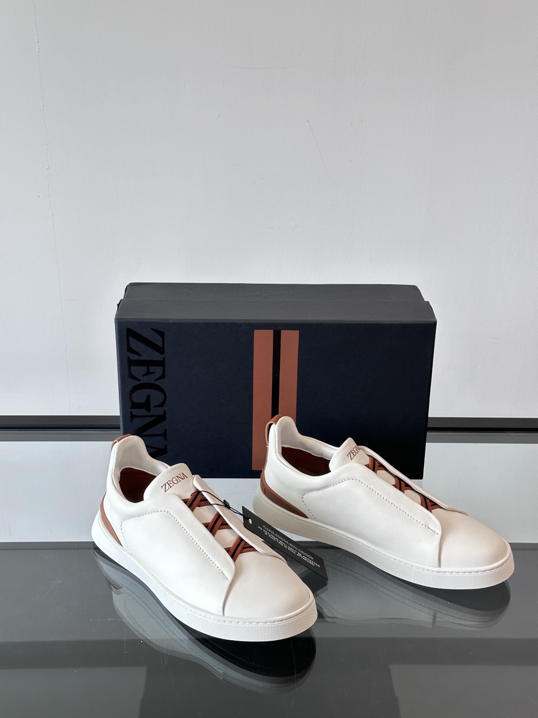 ZEGNA/杰尼亚 新款男士低帮皮革运动鞋，选用进口牛皮打造，丰富的工艺细节，鞋底骆马皮革嵌饰和品牌压纹