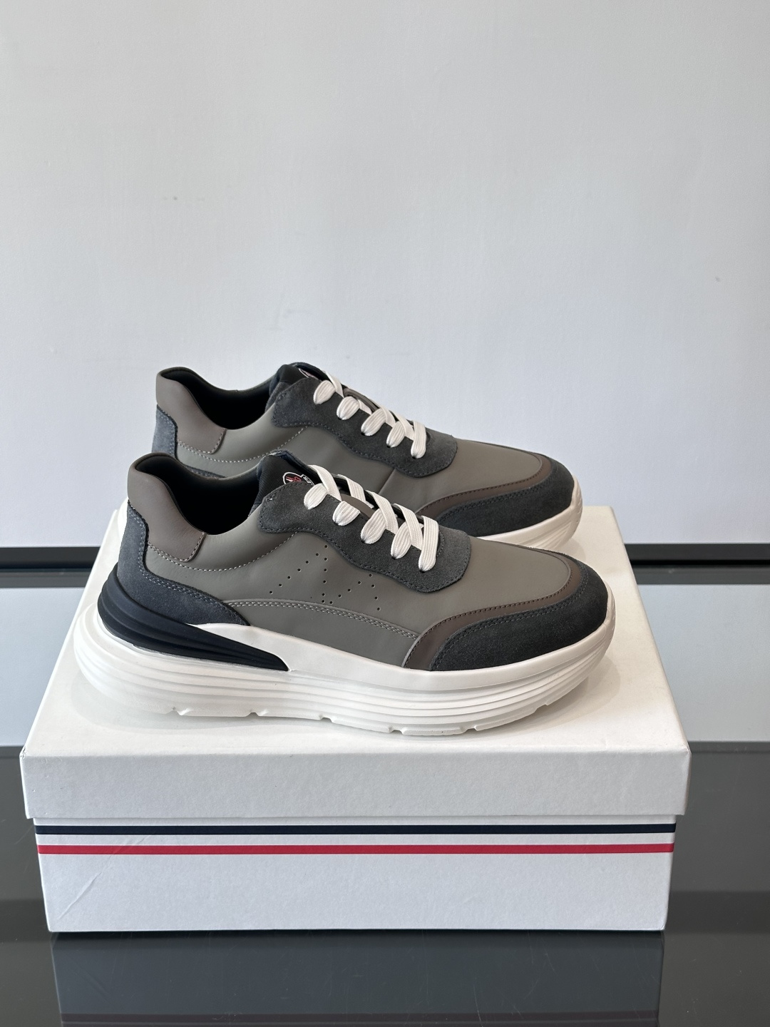 Moncler Chunky Sole Sneakers – White, Gray, and Blue – Versatile & Stylish