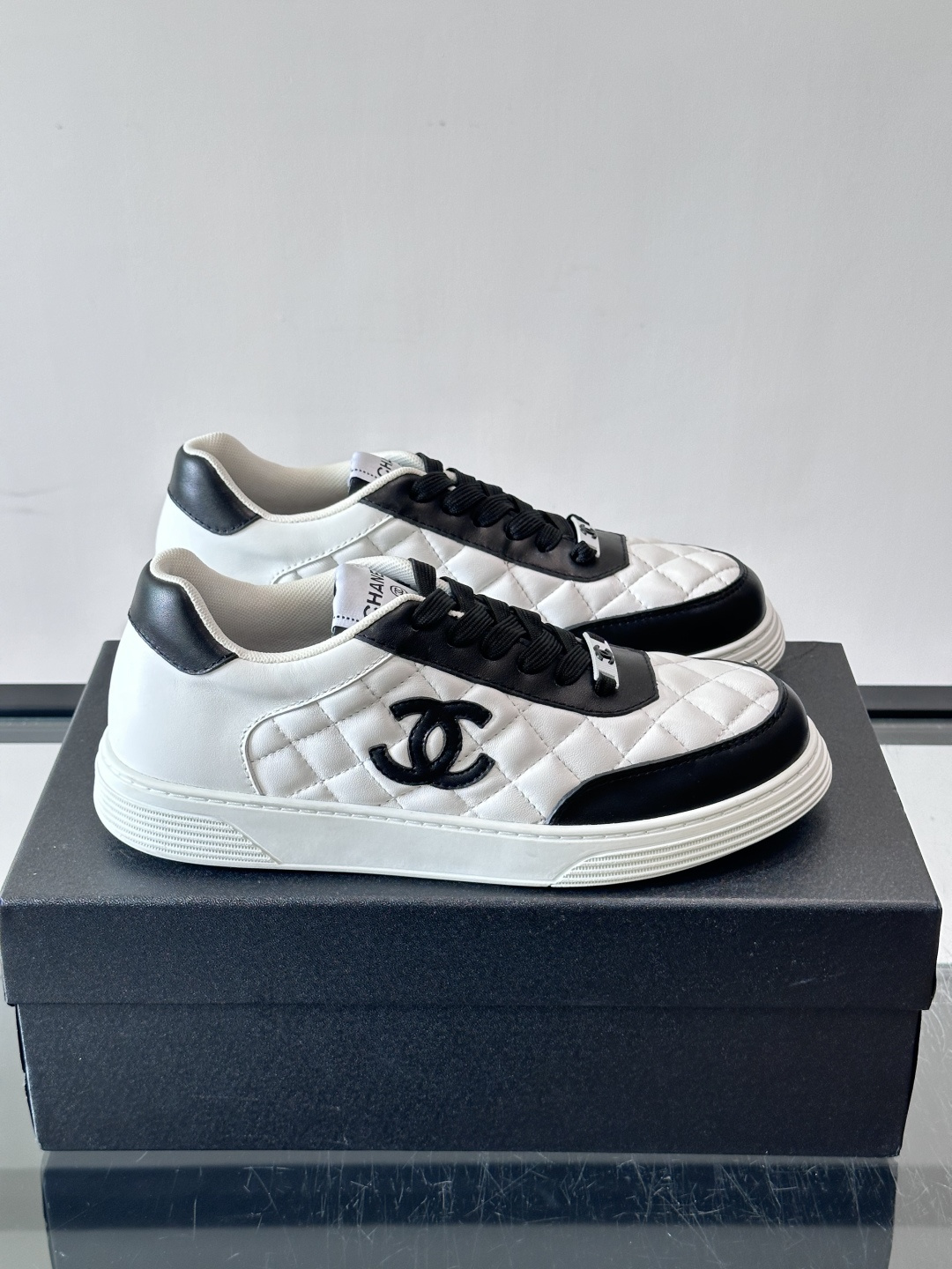 Chanel Quilted CC Logo Sneakers