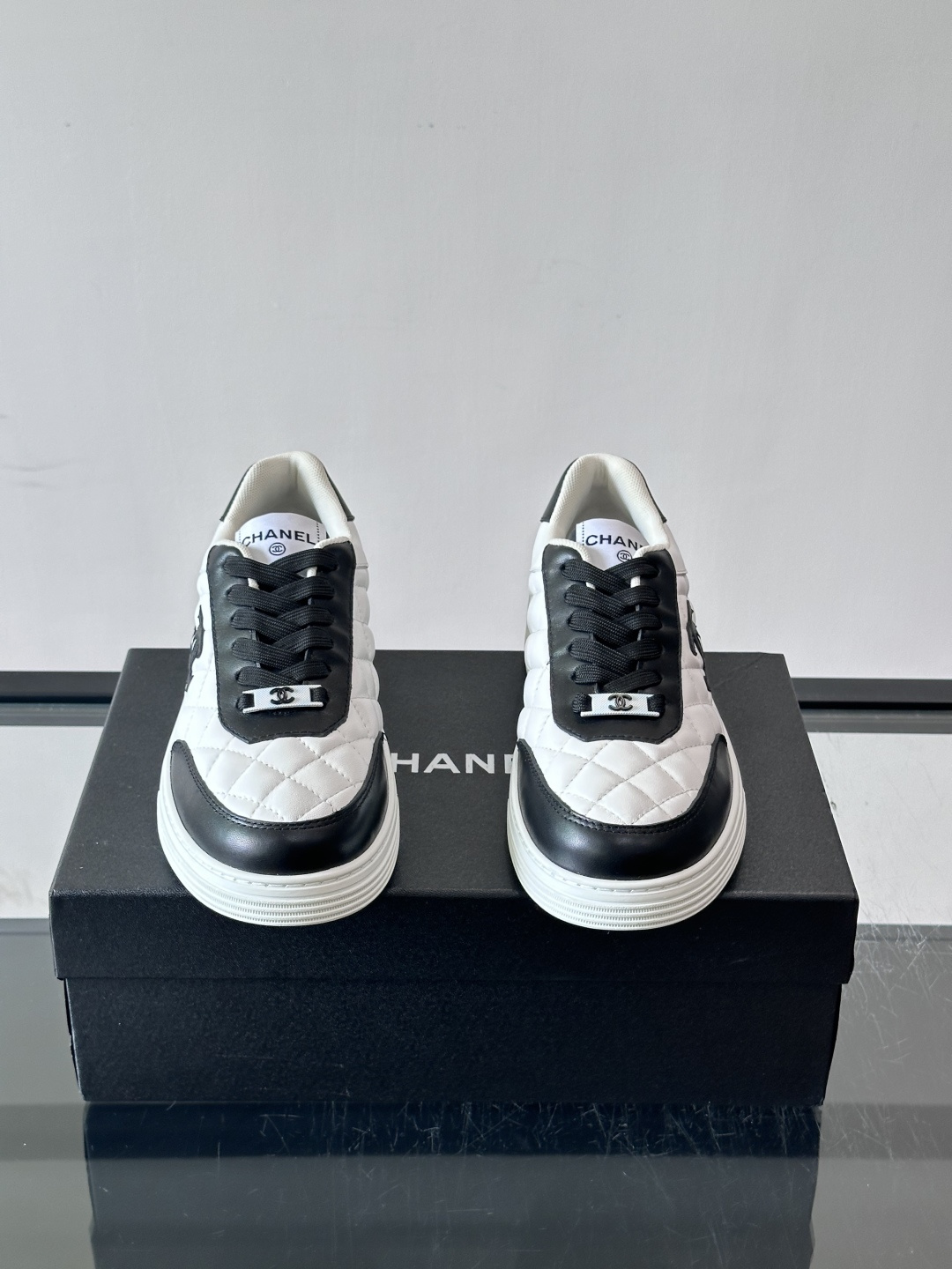 Chanel Quilted CC Logo Sneakers