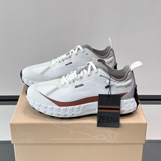 ZEGNA × Norda 联名越野跑鞋,针织网面鞋身搭配皮革拼接,鞋舌处有"ZEGNA"和"norda"双品牌 ZEGNA × Norda 联名越野跑鞋,针织网面鞋身搭配皮革拼接,鞋舌处有"ZEGNA"和"norda"双品牌