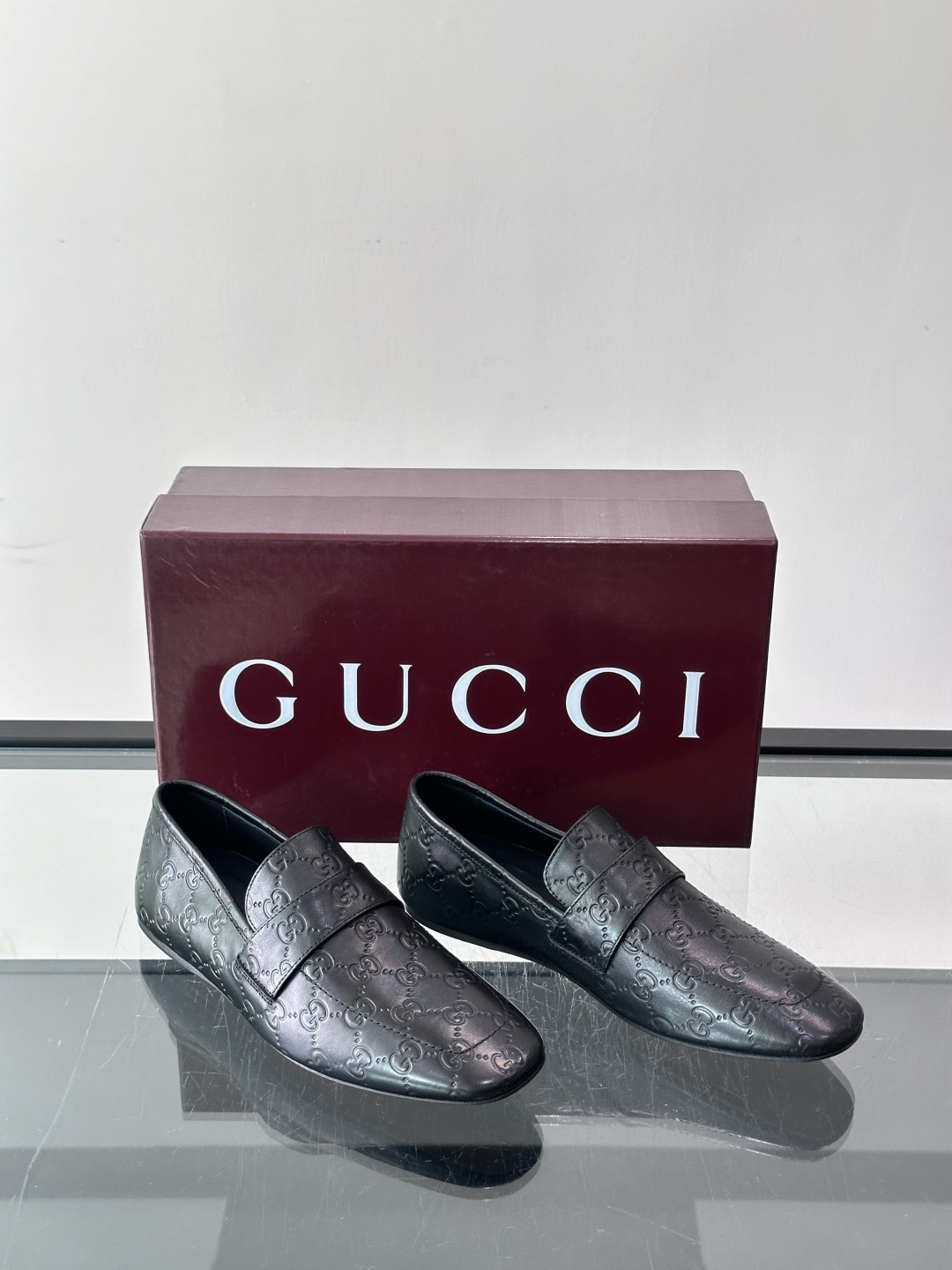 Gucci Embossed GG Leather Loafers