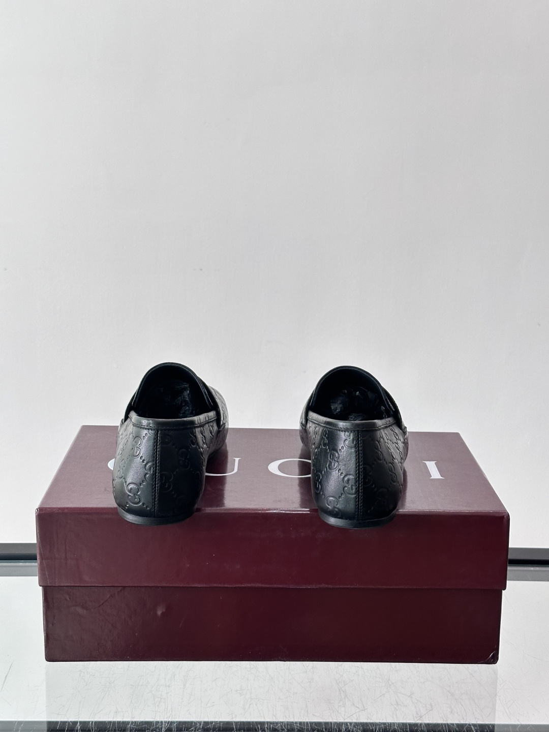 Gucci Embossed GG Leather Loafers