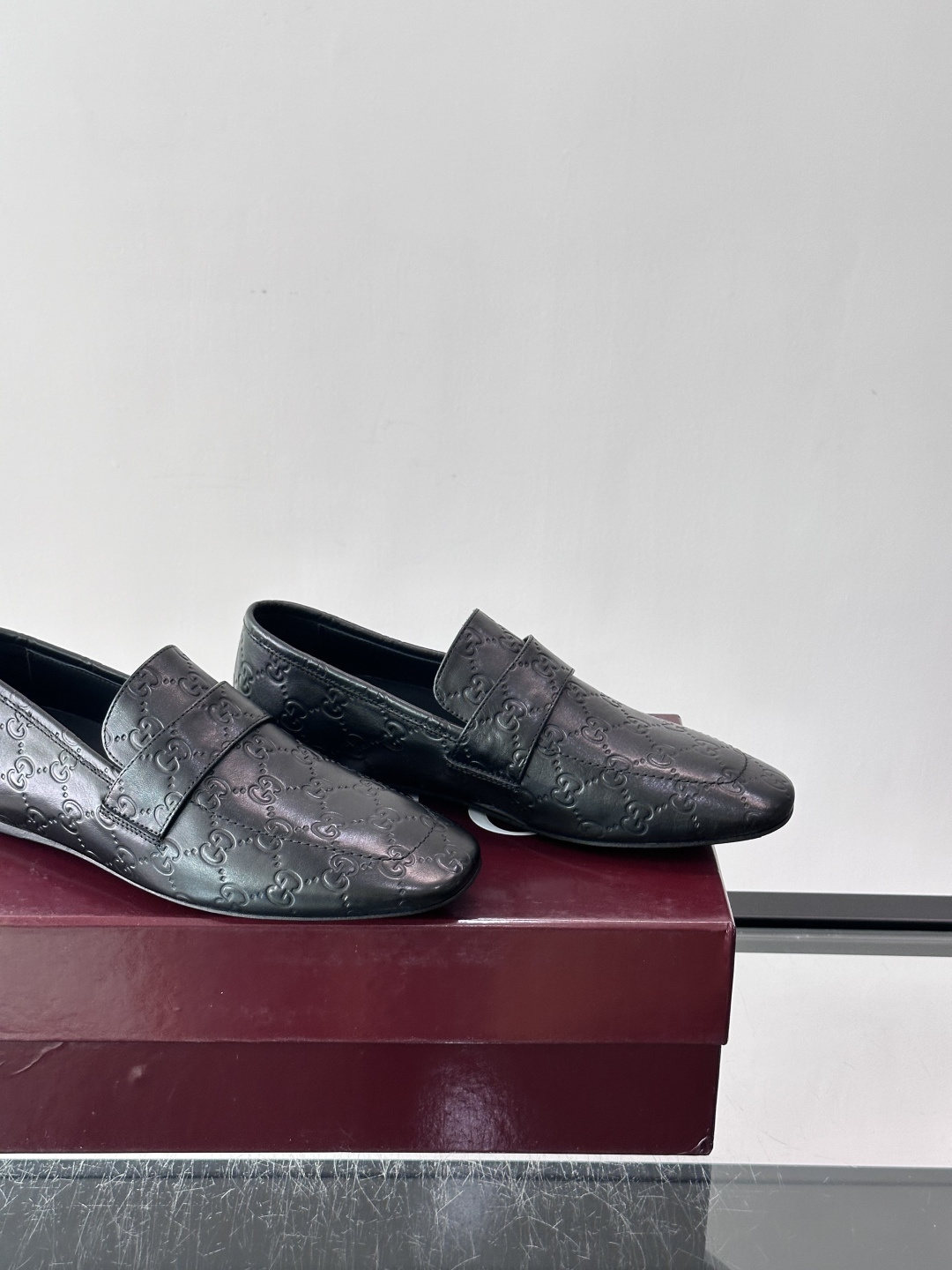 Gucci Embossed GG Leather Loafers