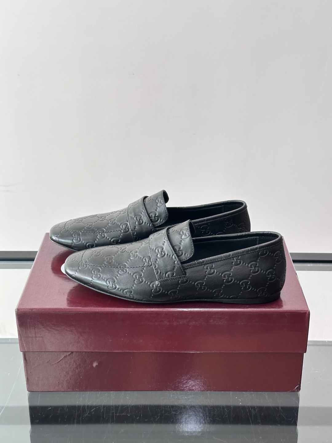 Gucci Embossed GG Leather Loafers