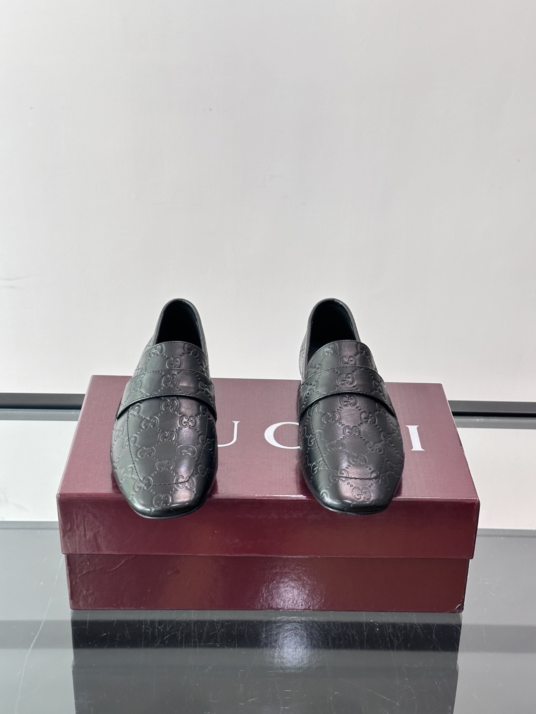 Gucci Embossed GG Leather Loafers