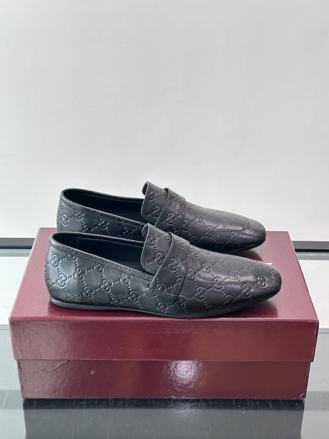 Gucci Embossed GG Leather Loafers