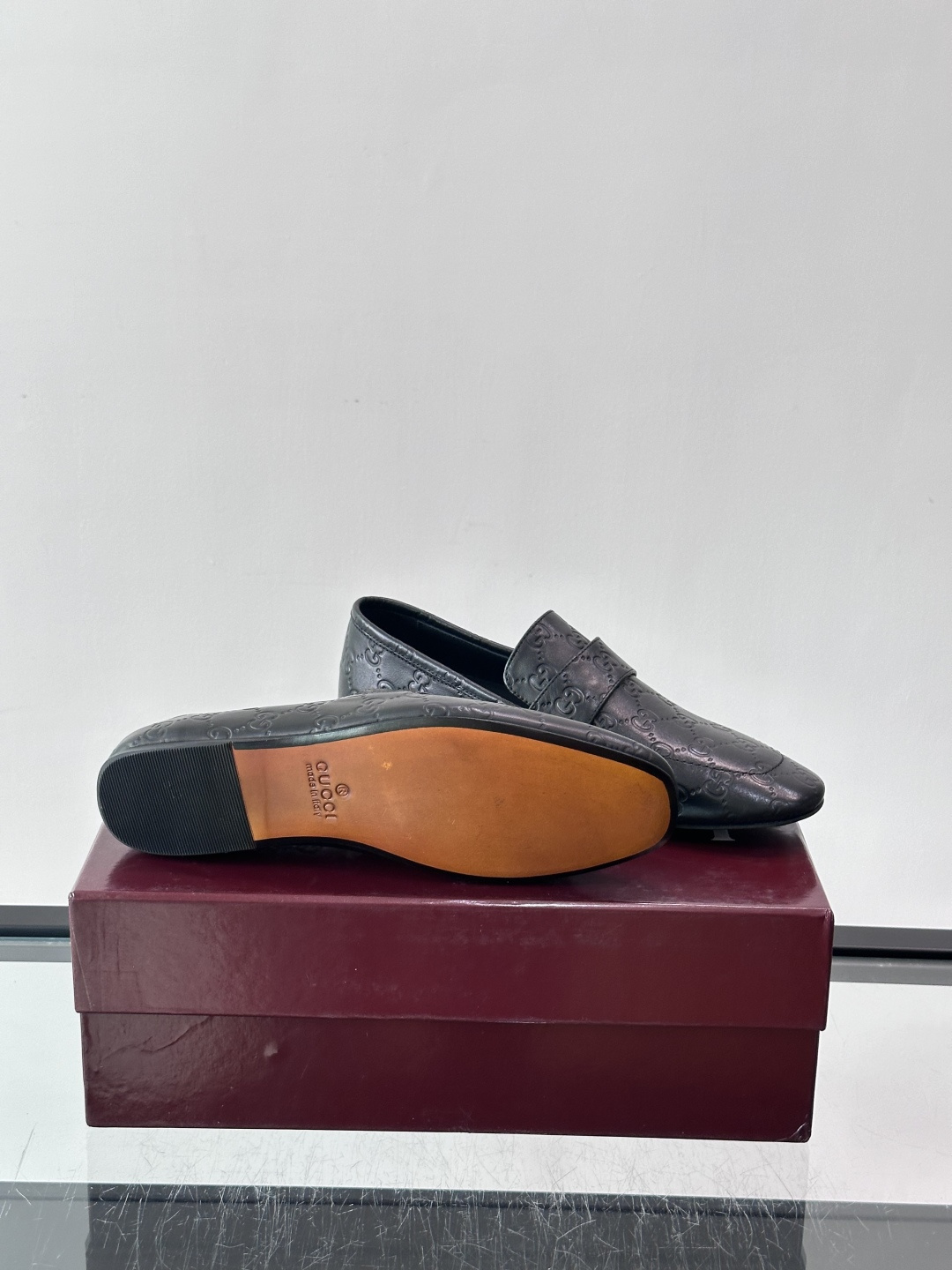 Gucci Embossed GG Leather Loafers