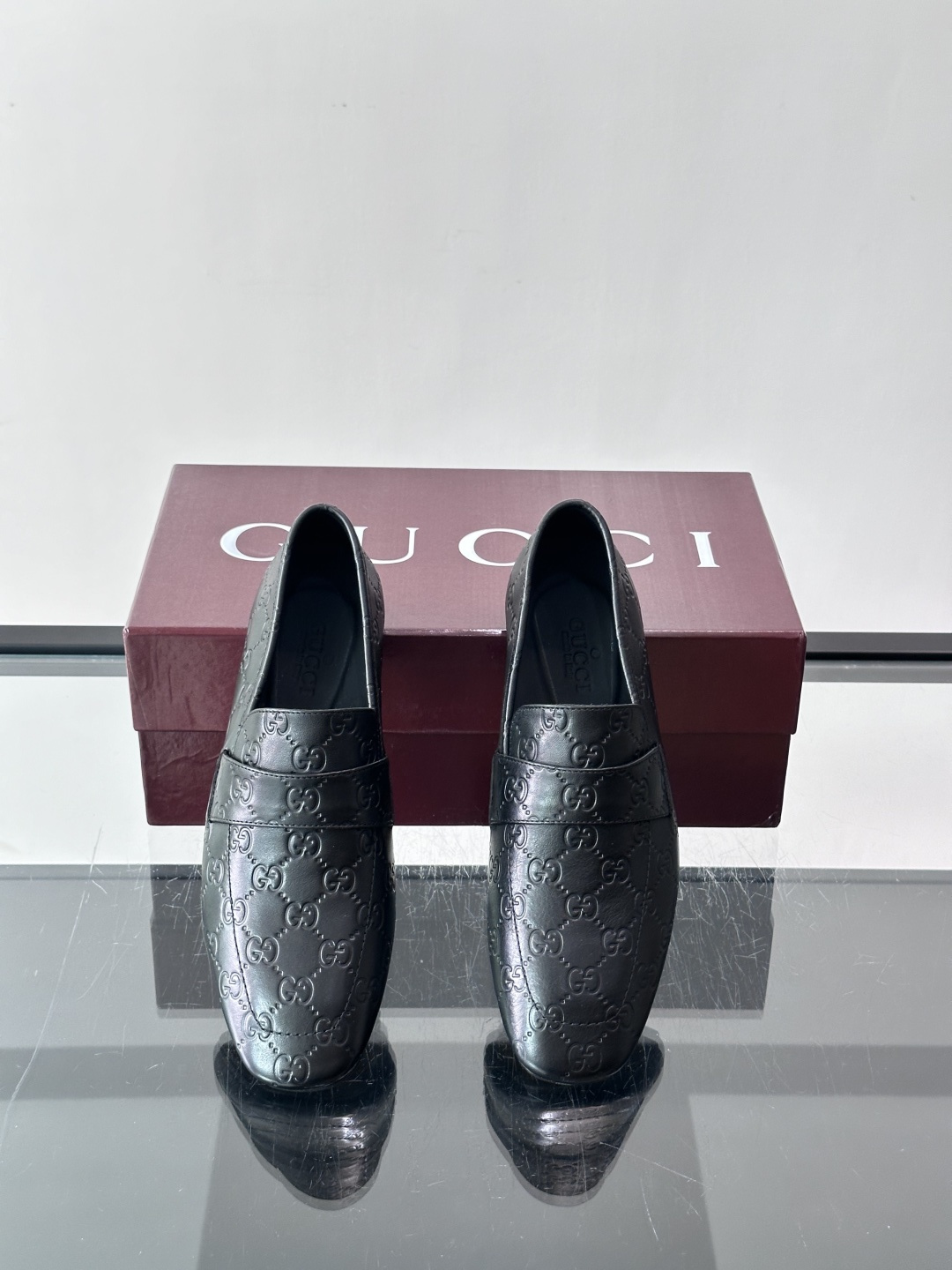 Gucci Embossed GG Leather Loafers