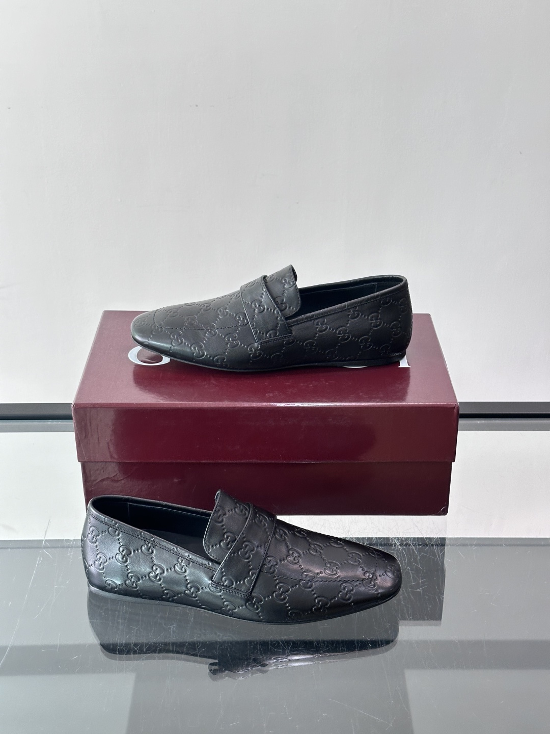 Gucci Embossed GG Leather Loafers