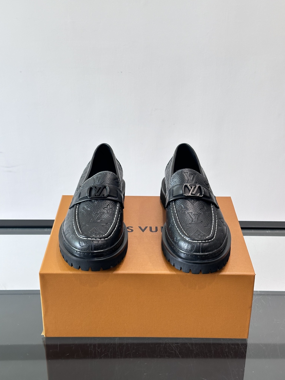 LV Monogram Embossed Leather Loafers