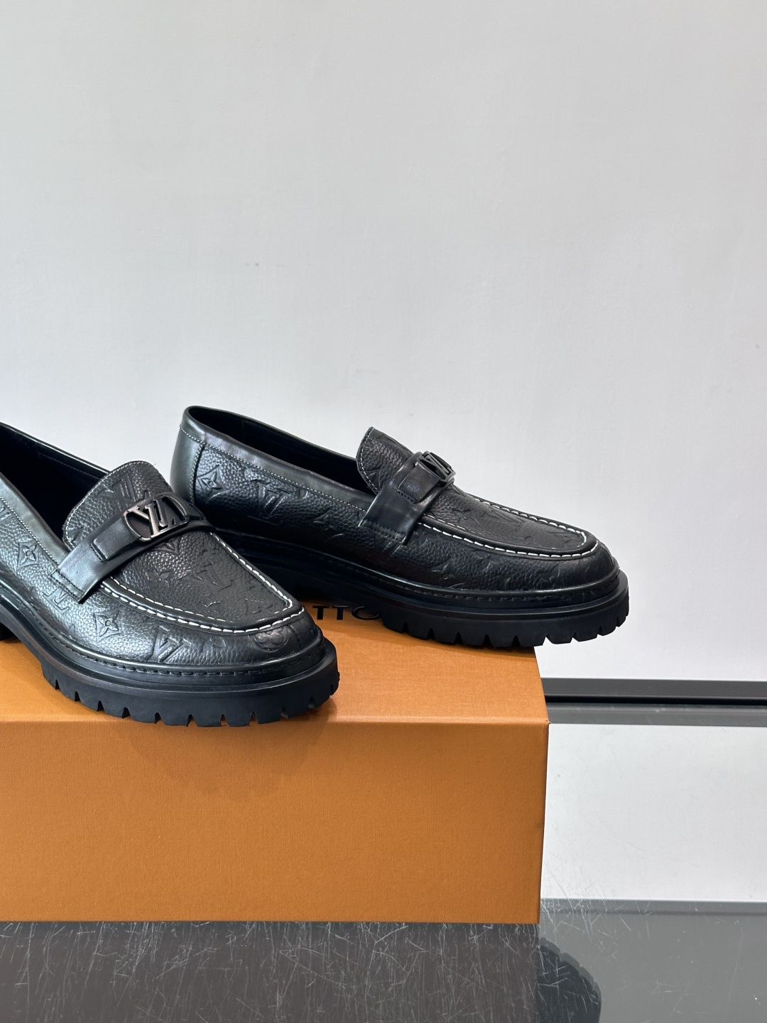 LV Monogram Embossed Leather Loafers