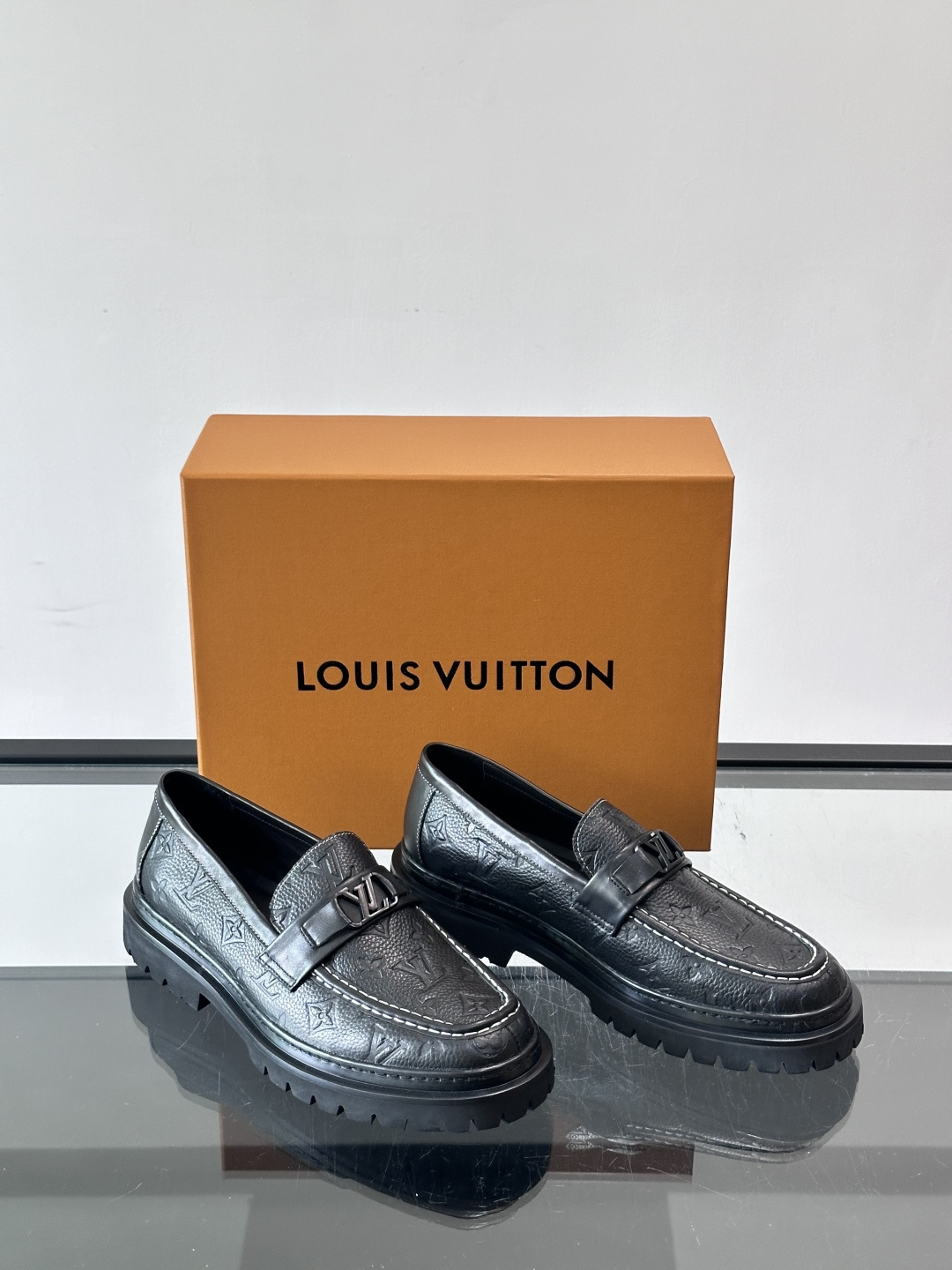 LV Monogram Embossed Leather Loafers