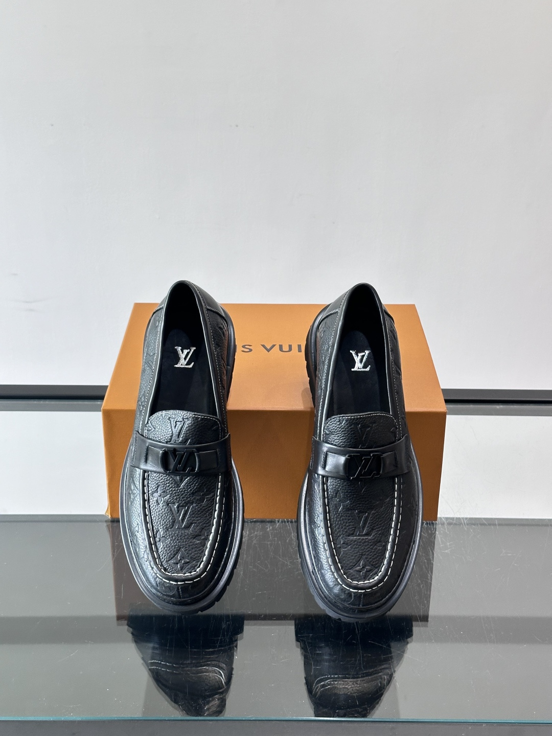 LV Monogram Embossed Leather Loafers