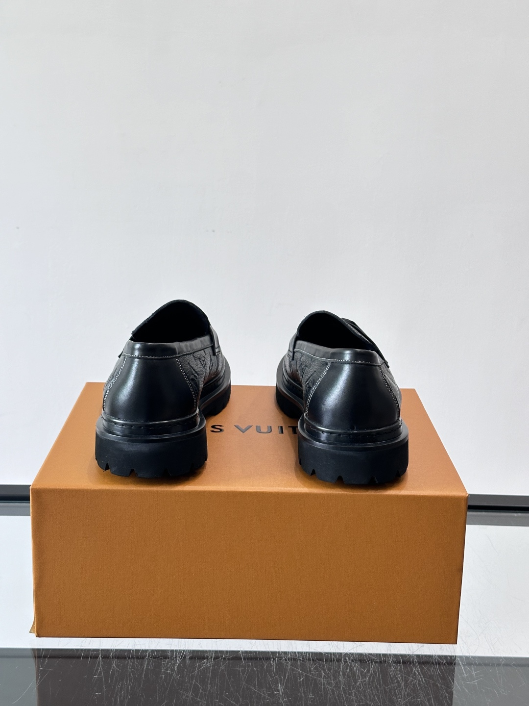 LV Monogram Embossed Leather Loafers
