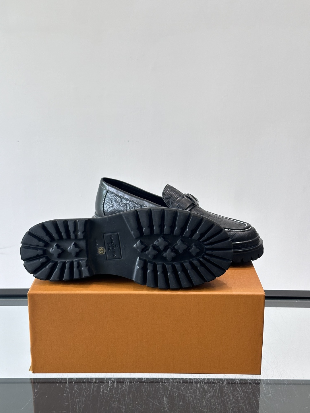 LV Monogram Embossed Leather Loafers