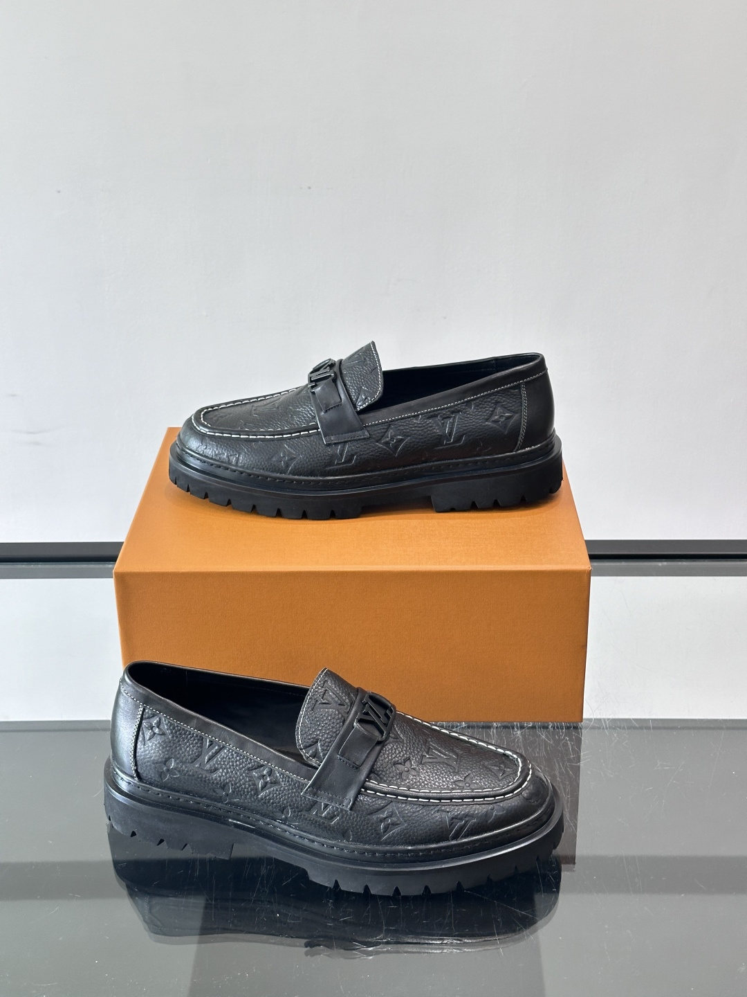 LV Monogram Embossed Leather Loafers