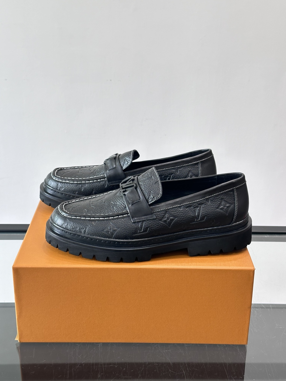 LV Monogram Embossed Leather Loafers
