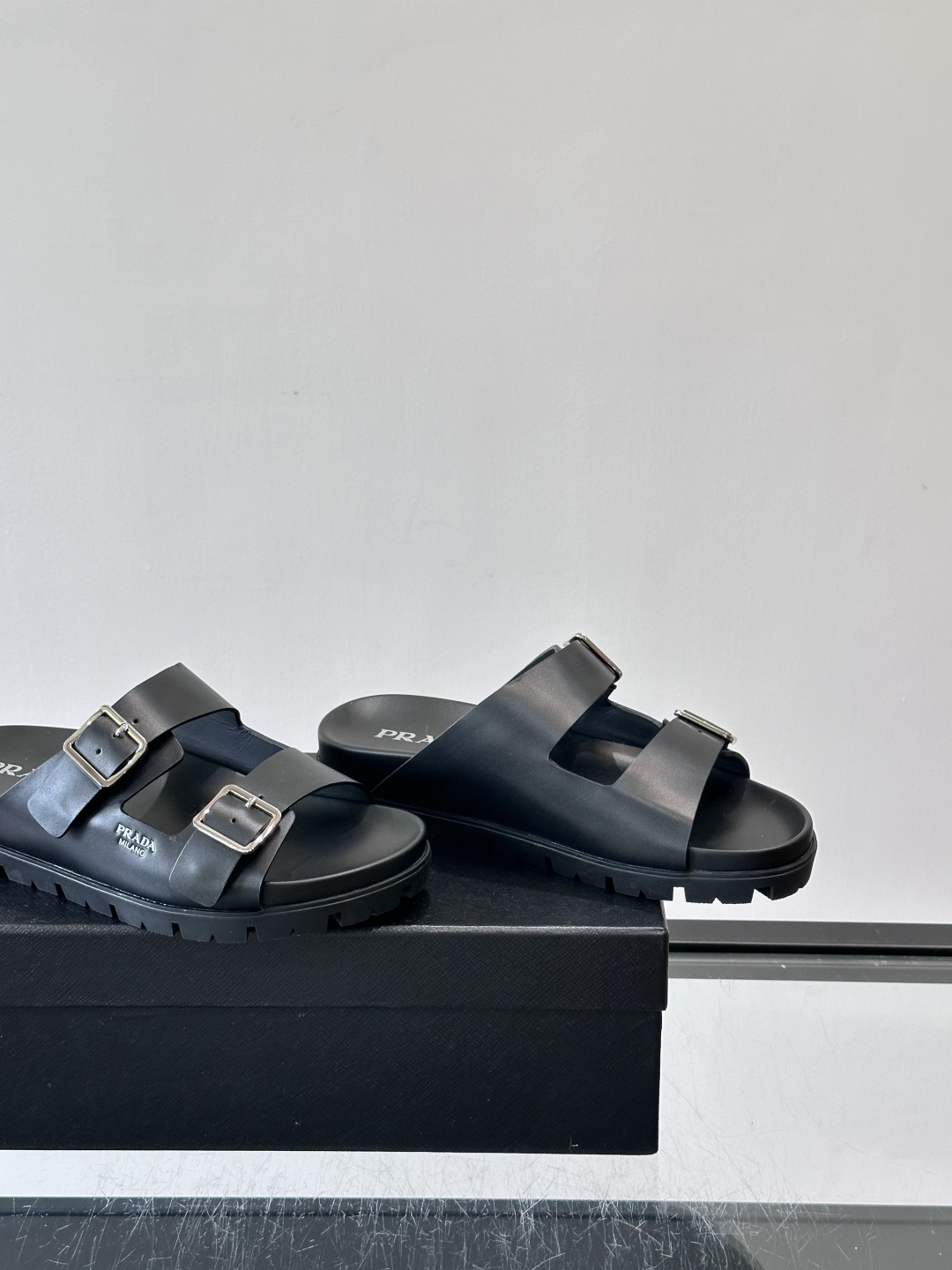 Prada Black Double Buckle Lug Sole Slide Sandals