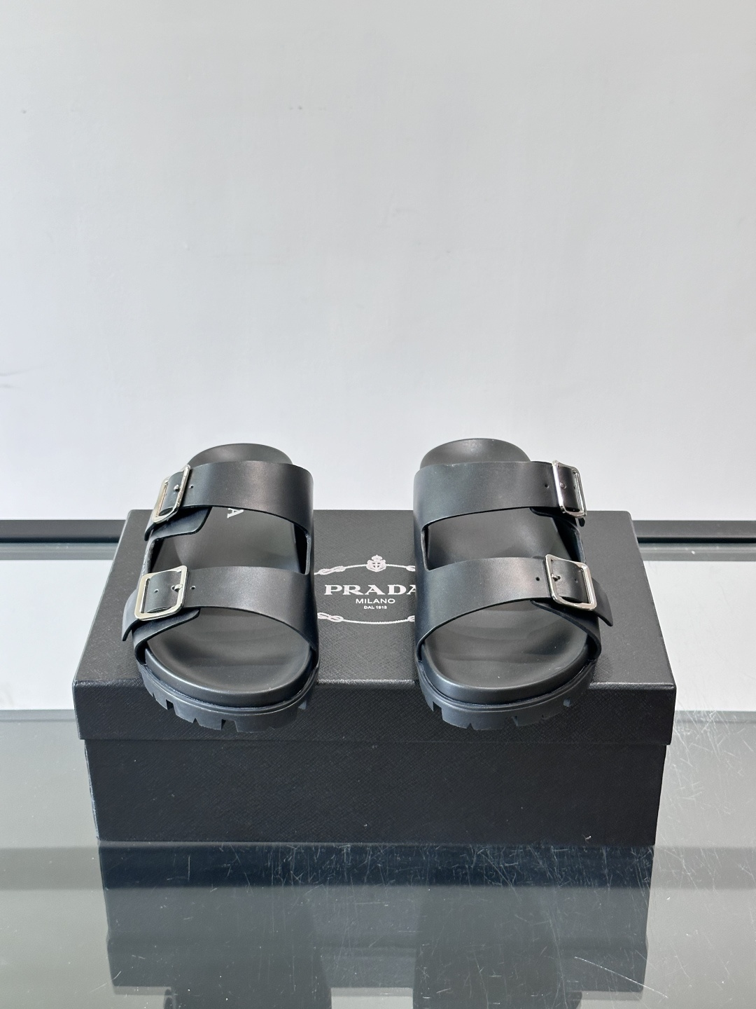 Prada Black Double Buckle Lug Sole Slide Sandals