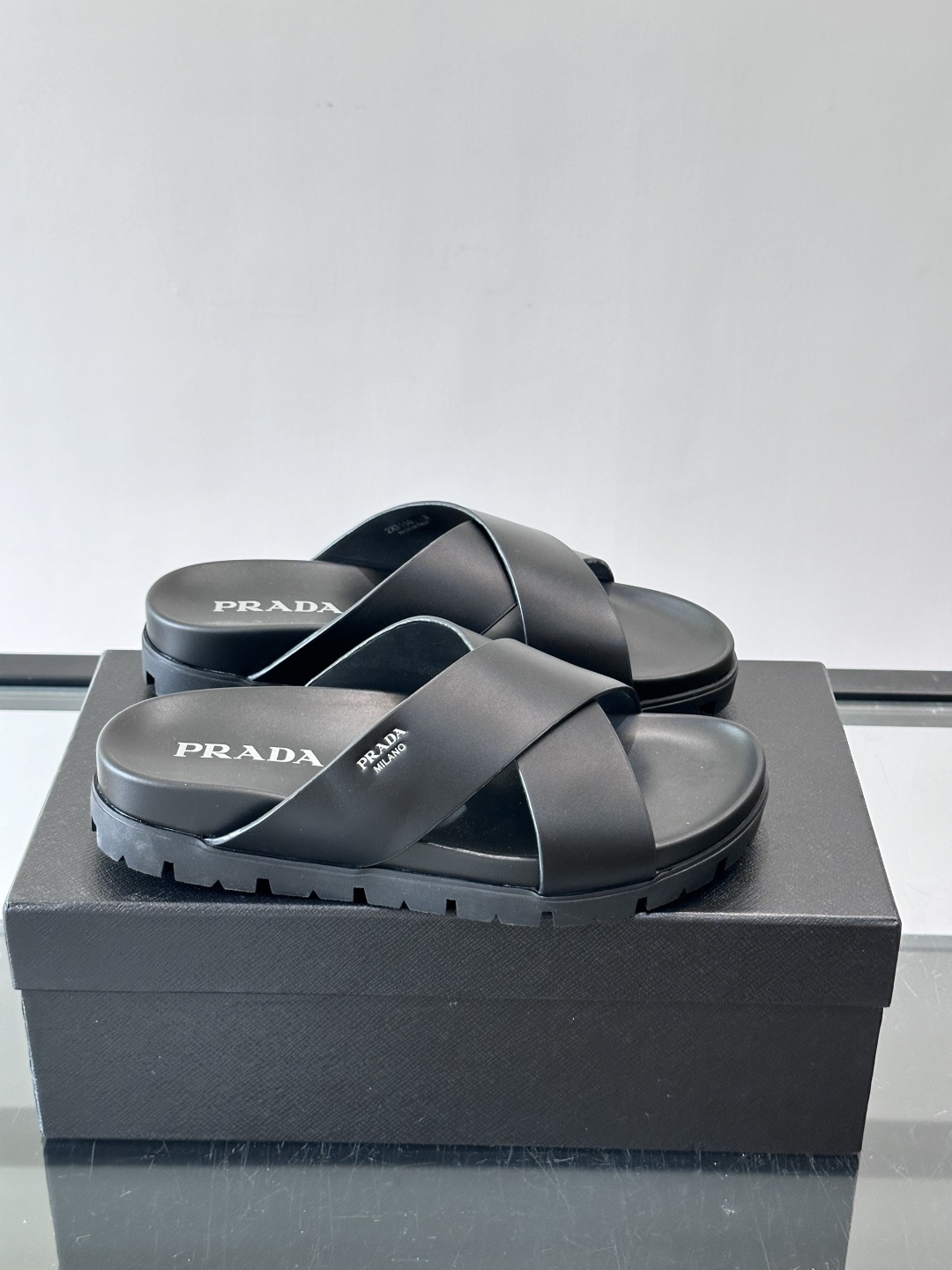 Prada Black Cross Strap Lug Sole Slide Sandals