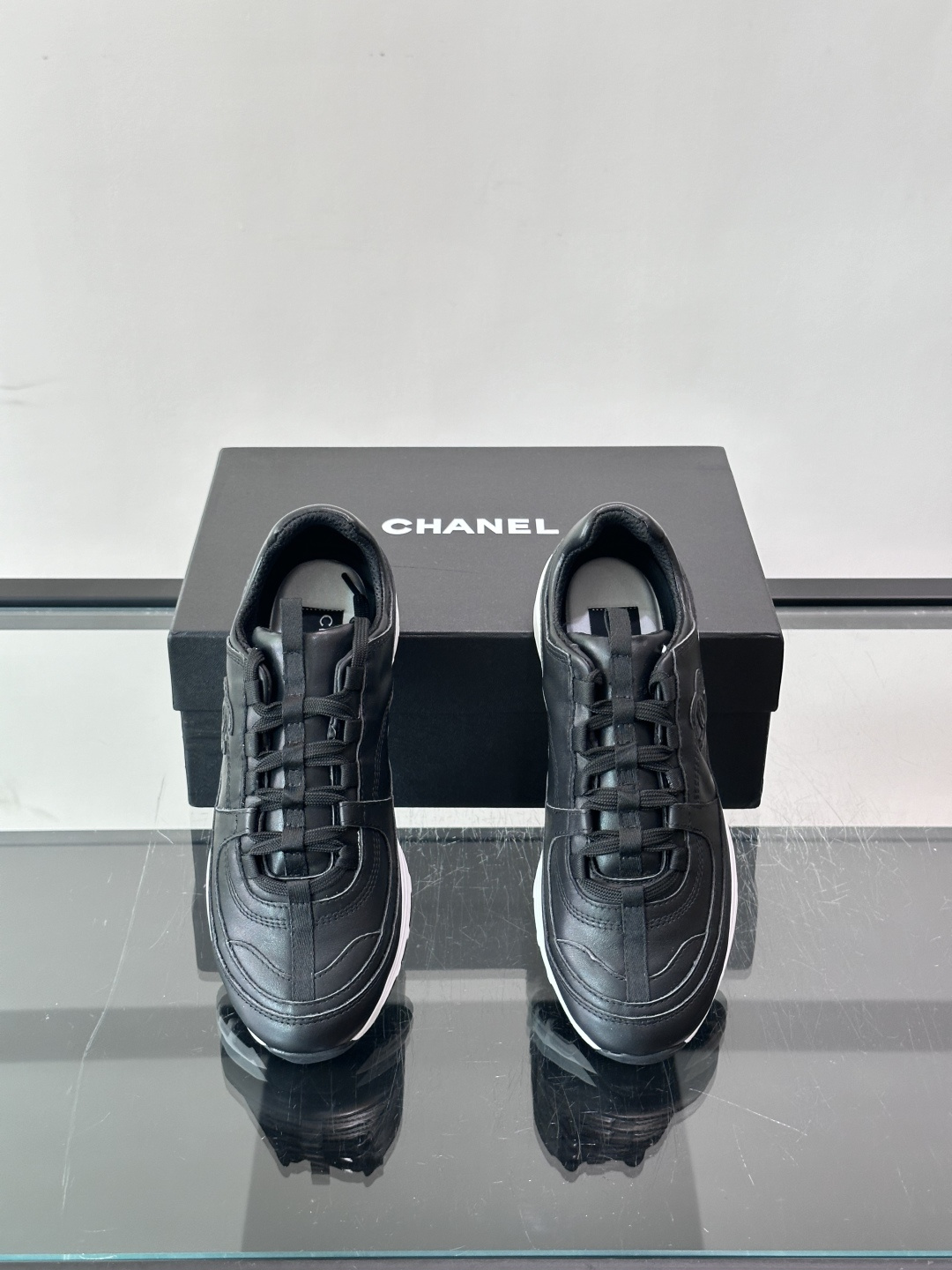 Chanel Black Leather Sneakers
