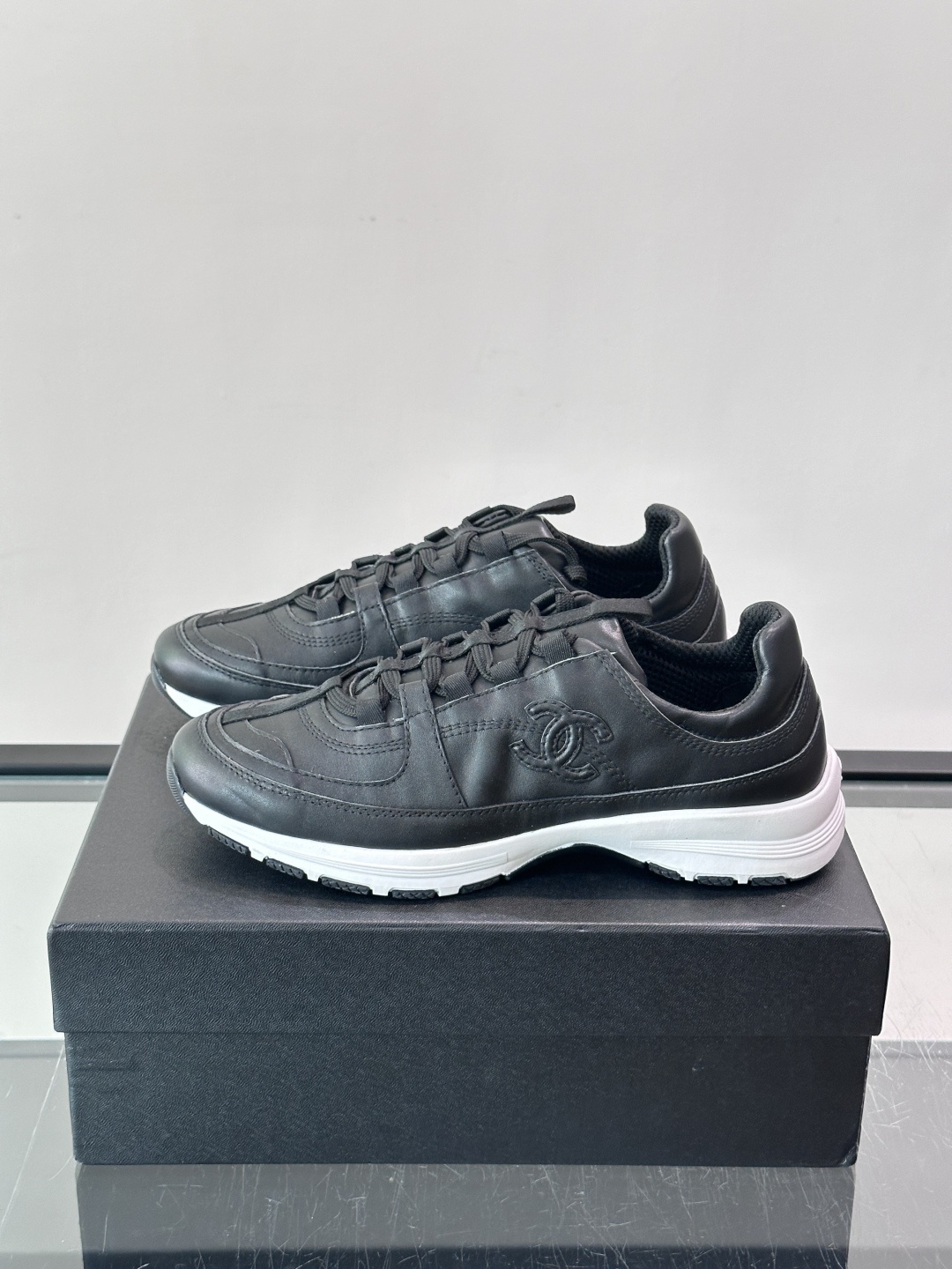 Chanel Black Leather Sneakers